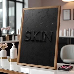 Minimalist printable wall art featuring the word "SKIN" embossed on a lightly textured, black concrete-style background, perfect for esthetician, dermatology office, med spa, or skincare gift decor.