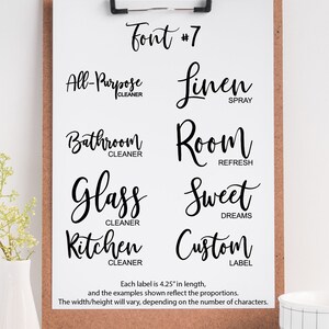 May include: A white clipboard with a black clip holds a sheet of paper with a font sample. The font is a cursive script style. The text on the sheet reads "Font #7" and includes examples of the font with different words like "All-Purpose Cleaner", "Linen Spray", "Bathroom Cleaner", "Room Refresh", "Glass Cleaner", "Sweet Dreams", "Kitchen Cleaner", and "Custom Label". Each label is 4.25 inches in length.
