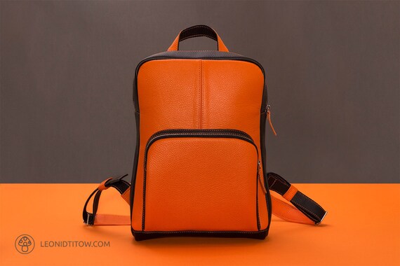 orange leather backpack