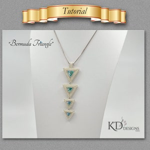 May include: A silver chain necklace with a pendant made of white beads and turquoise blue stones. The pendant is shaped like four stacked triangles. The necklace is displayed on a white background with the text "Bermuda Triangle" above it.
