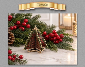 May include: A three-dimensional beaded Christmas tree ornament crafted from small green, red, and gold beads. The tree features a triangular structure with a gold beaded border. The text "Tutorial" appears in a gold banner, and "KD DESIGNS" is visible.