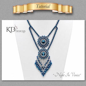 May include: A beaded necklace featuring deep blue and silver crystals arranged in two circular medallions with a cascading fringe. The design includes the text KD DESIGNS, Tutorial, and Night In Venice on a white display background.