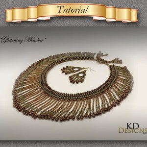 May include: A beaded necklace and matching earrings in shades of brown and green. The necklace features a fringe design and the earrings are teardrop shaped. The jewelry is labeled "KD Designs".