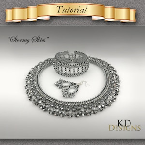 May include: A silver beaded jewelry set with a choker necklace, bracelet, and earrings. The set is called "Stormy Skies" and is designed by KD Designs.