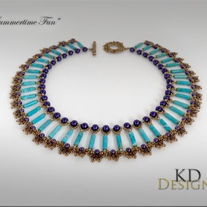 May include: A turquoise and purple beaded necklace with a gold-tone clasp. The necklace is made with small, round beads and long, rectangular beads. The necklace is called "Summertime Fun".