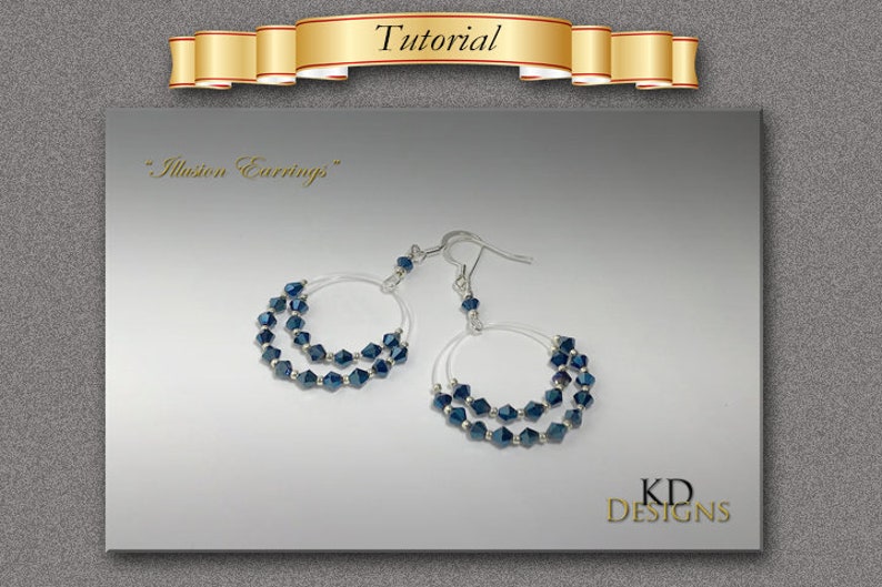 May include: A pair of silver hoop earrings with two rows of dark blue crystal beads. The earrings are labeled "Illusion Earrings".