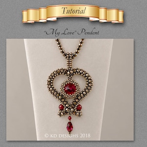 May include: A beaded pendant necklace featuring a central circular red crystal surrounded by metallic bronze beads in a heart-shaped frame. The design includes smaller red crystal accents and a dangling red bead. Text reads: Tutorial "My Love" Pendent.