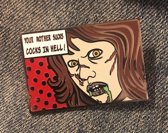 Regan MacNeil Comic Strip Pin w/ Red background