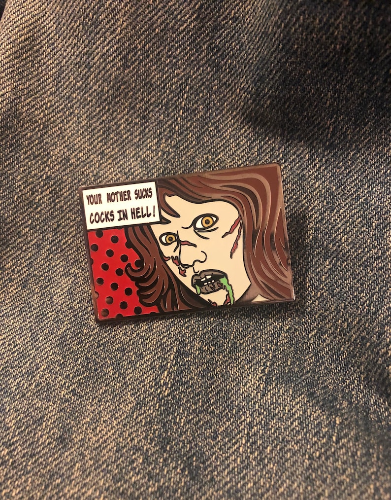 Regan MacNeil Comic Strip Pin w/ Red background Red