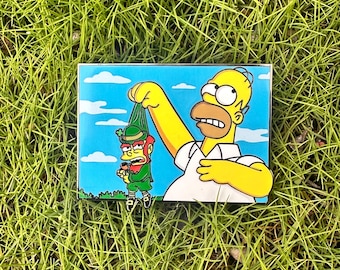 Die Simpsons inspiriert Homer Simpson fängt einen Leprachaun St Patty's Day Emaille Pin
