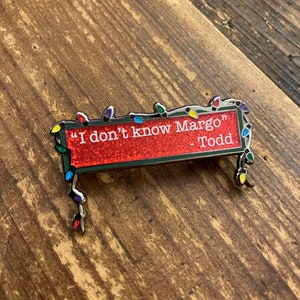 Christmas Vacation inspired “I don’t know Margo” enamel pin