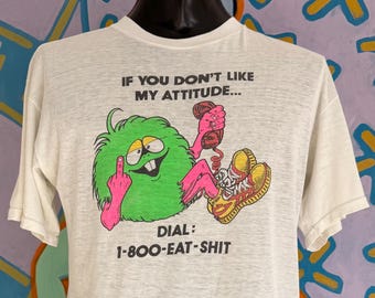 80s Camacho Monster “If You Don't Like My Attitude... Dial: 1-800-Eat-Shit” T-Shirt. Single Stitch - Size Large 21" x 28.75”