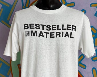 90s Simon & Schuster Bestseller Material Bool Publisher T-Shirt. Single Stitch. Made in USA - SizeL/XL 22.75" x 29.5"