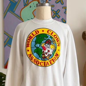 90s World Clown Association Crewneck Sweatshirt. Vintage 1990s World Clown Association Raglan Sweatshirt. Made in USA - Size L 23&quot; x 28&quot;