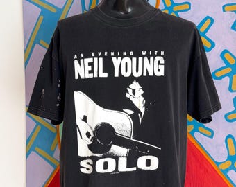 1999 Neil Young Solo Concert T-Shirt. Paint Splattered. Size XL 23.75” x 29.75”