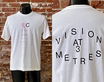 90s Optometrist Optomatters cv Belgium Vision Matters Eye Chart T-Shirt. Vintage 1993 Optometry Tee Single Stitch - Medium 20.5" x 28.5"