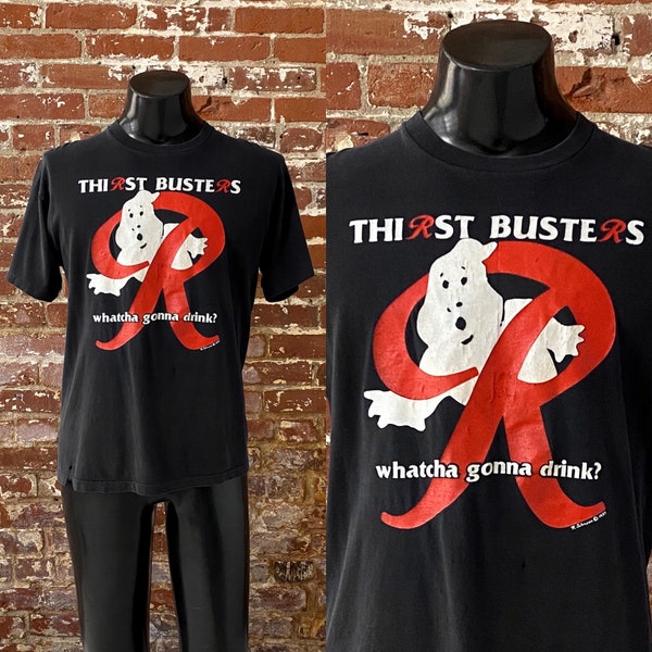 1984 Rainier “Thirst Busters Whatcha Gonna Drink?” Beer T-Shirt. Vintage 80s Rainier Beer Ghost Busters Parody Tee - Med 20.5" x 27"