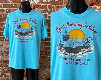 1991 Good Morning Saddam Turquoise Graphic T-shirt. Vintage 90s