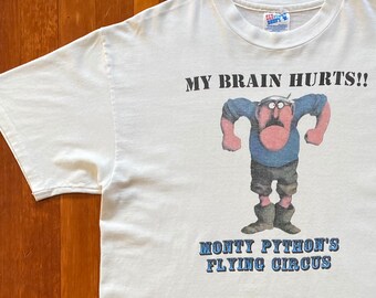 90s Monty Python My Brain Hurts Promo T-Shirt. Vintage 1990s Monty Python’s Flying Circus My Brain Hurts!! Comedy Skit Promo Tee. Size L.