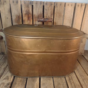 May include: A set of three ceramic mugs with a speckled, matte finish. The mugs are in shades of cream, light gray, and dark gray. Each mug has a simple, minimalist design and a rounded handle.