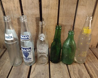 Vintage Soda Bottle Lot: Pepsi, Tab, Welch’s, Fanta - Retro Bar Decor