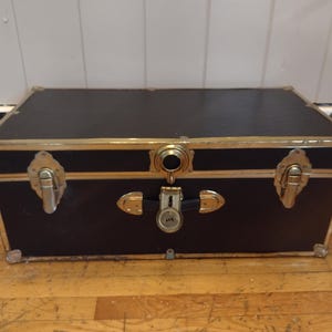 Vintage Wooden Storage Trunk: Rustic Travel Chest with Metal Trim