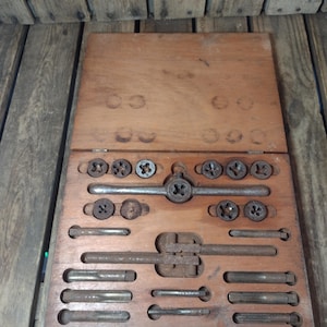 May include: A white ceramic mug with a black handle and the text "But First, Coffee" in a handwritten style. The mug is likely 11 ounces in size, perfect for a morning beverage.