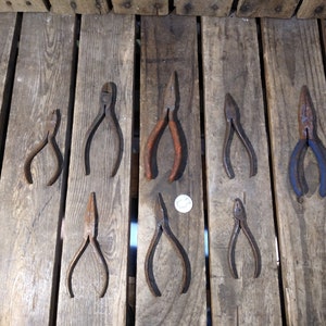 8 Vintage Rusty Pliers