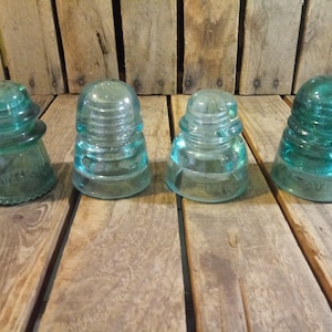 4 Vintage Glass Insulators