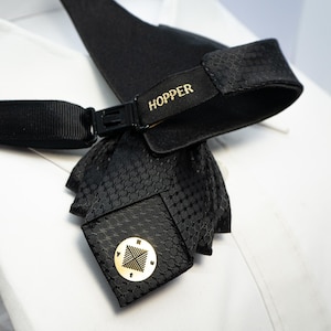 The tie that dresses you up, gift for father, fancy bowtie, vestuvinis kaklaraištis, vestuvinė varlytė, kaklaraištis žiogas
Handmade luxury black bow tie for weddings
Designer black bow tie for grooms and musicians
High-end handmade black tie for special occasions
Artistic luxury black bow tie for men
Unique wedding bow tie crafted by Rūta Piekurienė
Elegant handmade black bow tie for special events
Stylish black designer tie for men’s wedding attire