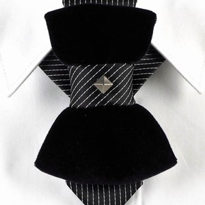 Unique black necktie, Wedding bow tie, Attention magnet black cravat, Black unisex tie black velvet vertical bow tie, designer statement tie for men, unique groom wedding bow tie, handmade velvet bow tie, modern vertical bow tie design, black velvet groom tie, artistic men’s neckwear accessory, luxury designer bow tie, pinstripe accent bow tie, metallic stud bow tie detail, elegant groom wedding accessory, contemporary formal bow tie, unique men’s wedding tie, statement bow tie for tuxedo
