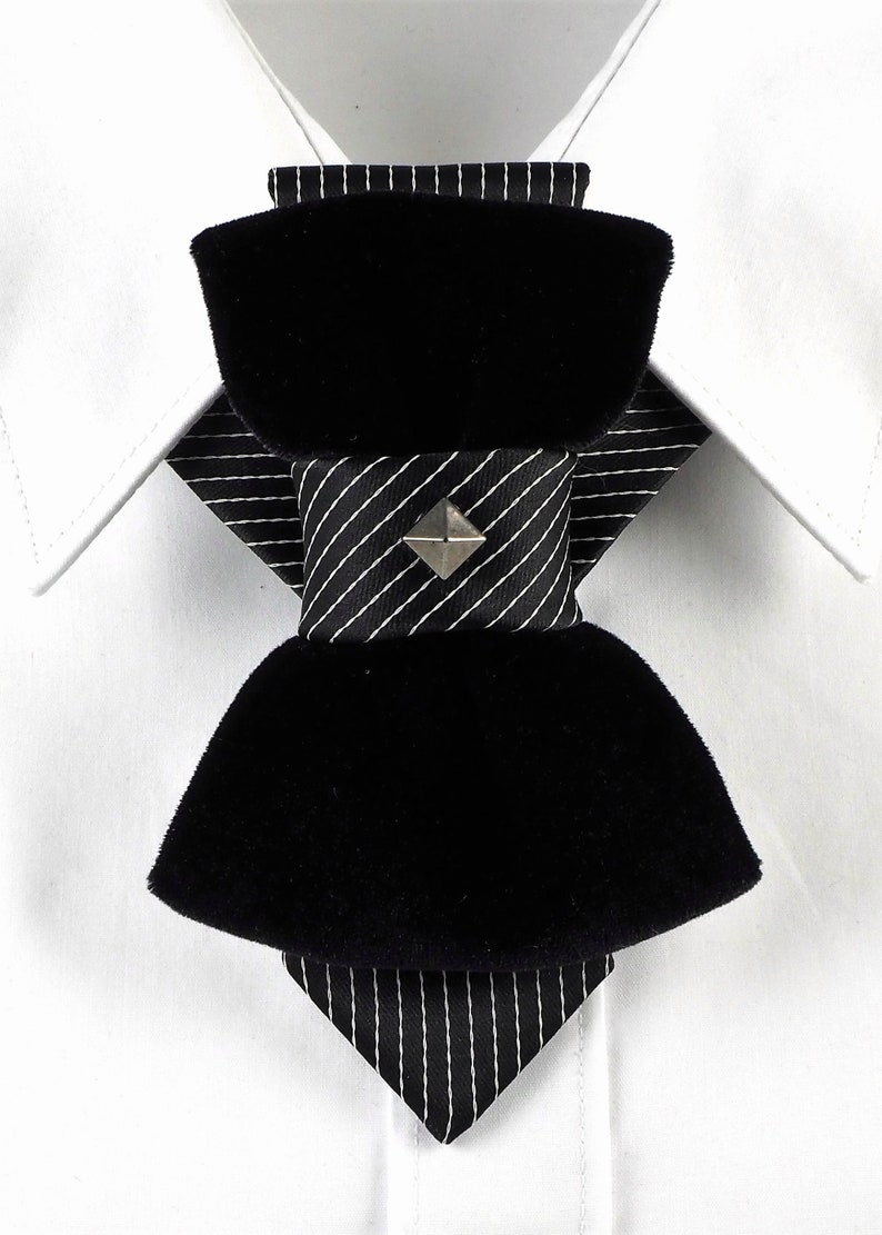 Unique black necktie, Wedding bow tie, Attention magnet black cravat, Black unisex tie black velvet vertical bow tie, designer statement tie for men, unique groom wedding bow tie, handmade velvet bow tie, modern vertical bow tie design, black velvet groom tie, artistic men’s neckwear accessory, luxury designer bow tie, pinstripe accent bow tie, metallic stud bow tie detail, elegant groom wedding accessory, contemporary formal bow tie, unique men’s wedding tie, statement bow tie for tuxedo