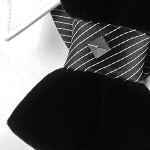 Unique black necktie, Wedding bow tie, Attention magnet black cravat, Black unisex tie black velvet vertical bow tie, designer statement tie for men, unique groom wedding bow tie, handmade velvet bow tie, modern vertical bow tie design, black velvet groom tie, artistic men’s neckwear accessory, luxury designer bow tie, pinstripe accent bow tie, metallic stud bow tie detail, elegant groom wedding accessory, contemporary formal bow tie, unique men’s wedding tie, elegant velvet neckwear