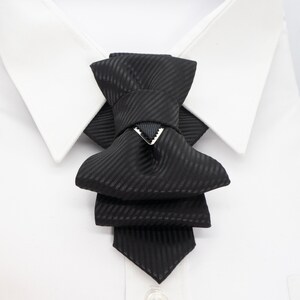 Black Tie Event
Chic Fashion Tie
Minimalist Bow Tie
Artisan Accessories
Perfect Gift for Him
Statement Neckwear
Stylish Tie
Tailored Necktie
Wedding Necktie
Formal Necktie
Luxury Necktie
Groomsmen Gift Idea
Handcrafted Men’s Wear
Unisex Tie
Unique Design Tie
Black bow tie for wedding, wedding black tie, unique tie for groom, vertical bow tie