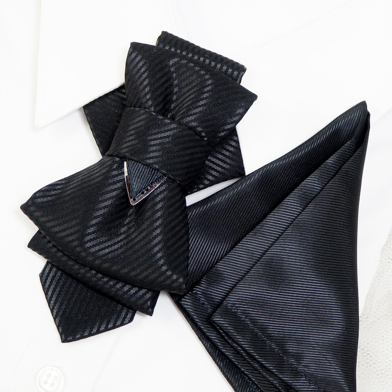 unique tie for groom, black bow tie for wedding, minimalist bow tie, stylish tie, wedding black tie, statement neckwear, modern necktie, formal neckwear, luxury fashion accessory, handcrafted men’s wear, chic fashion tie, groomsmen gift idea, vertical bow tie, timeless style tie, elegant neckwear, artisan accessories, tailored necktie, unisex tie, classic necktie, handmade necktie