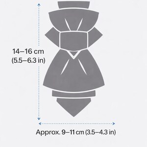 May include: A gray, stylized illustration of a bow tie. The bow tie is approximately 5.5-6.3 inches in length and 3.5-4.3 inches in width. The image includes measurements in inches and centimeters.