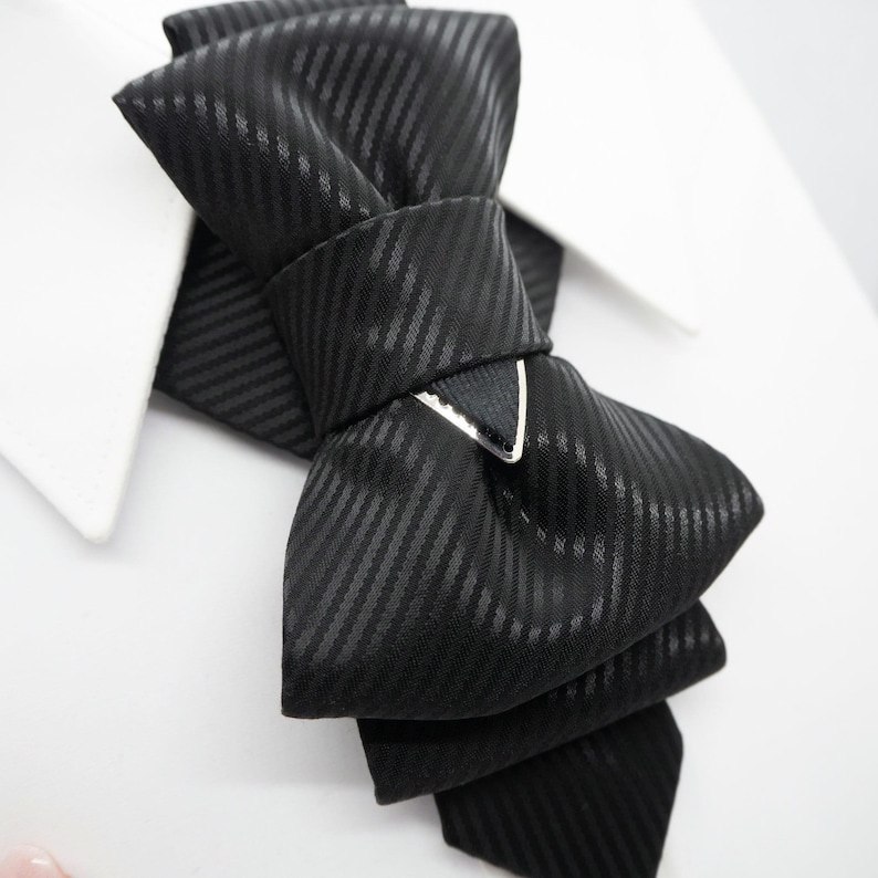 Black bow tie for wedding, wedding black tie, unique tie for groom, vertical bow tieTimeless Style Tie
Handmade Necktie
Luxury Fashion Accessory
Classic Necktie
Fashion Tie
Elegant Neckwear
Modern Necktie
Black Tie Event
Chic Fashion Tie
Minimalist Bow Tie
Artisan Accessories
Perfect Gift for Him
Statement Neckwear
Stylish Tie
Tailored Necktie
Wedding Necktie
Formal Necktie
Luxury Necktie
Groomsmen Gift Idea
Handcrafted Men’s Wear
Unisex Tie
Unique Design Tie