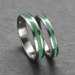 Titanium rings set. Titanium bands with central Malachite inlay. Matte finish, green stone inlay