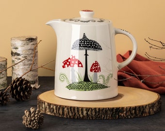 Handmade Ceramic Toadstool Teapot designed in the UK by Hannah Turner. Mushroom Teapot, part of toadstool tableware collection