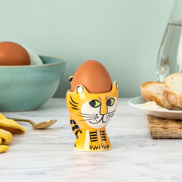 Handmade ceramic Tiger egg cup, designed in the UK by Hannah Turner. Perfect tiger gift for kids and adults