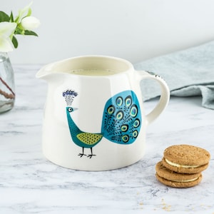 Handmade Ceramic Peacock Milk Jug, designed in the UK by Hannah Turner. Perfect Jug for the breakfast Table, Gift Boxed Pottery Creamer