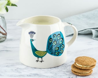 Handmade Ceramic Peacock Milk Jug, designed in the UK by Hannah Turner. Perfect Jug for the breakfast Table, Gift Boxed Pottery Creamer