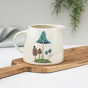 Handmade Ceramic Toadstool Milk Jug, designed in the UK by Hannah Turner. Mushroom Jug for the breakfast Table, Gift Boxed Pottery Creamer