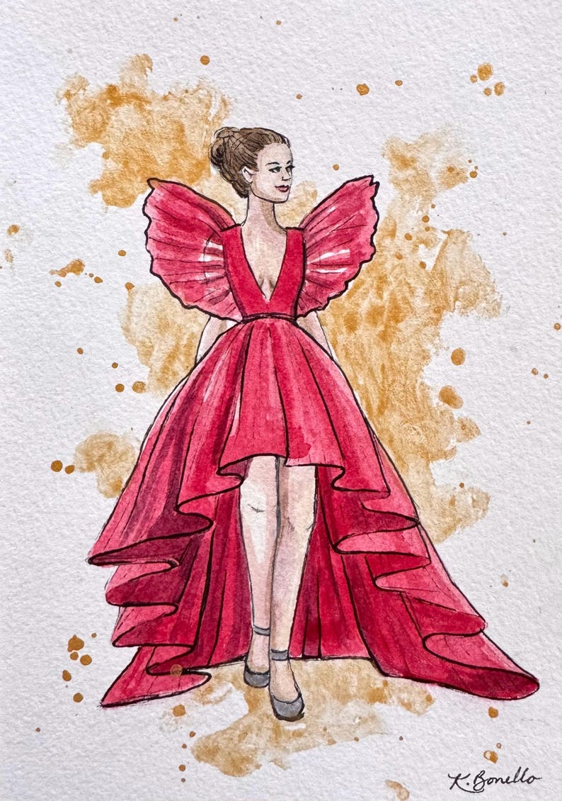 Peut inclure: Une tasse en c&eacute;ramique blanche avec une anse noire et le texte "But First, Coffee" en noir, en gras. La tasse est pos&eacute;e sur une surface blanche. La tasse est probablement pour les boissons chaudes.