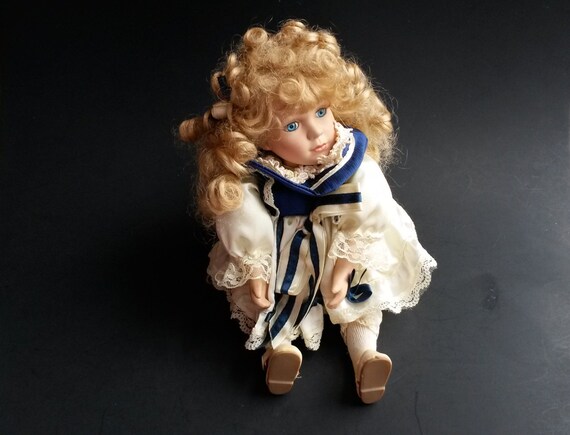 wind up musical porcelain doll