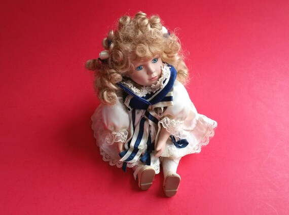 wind up porcelain doll