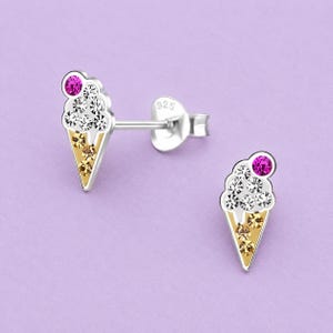 May include: A pair of sterling silver stud earrings shaped like ice cream cones. Each earring features a single bright pink crystal at the top, three clear white crystals in the middle, and three light brown crystals in the cone section.