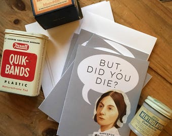 May include: An assortment of vintage medical supplies and stationery. Includes a box of Red Cross bandages, a tin of Quik-Bands, greeting cards with a Florence Nightingale illustration and the text "BUT, DID YOU DIE?", and a jar of Mentholatum.