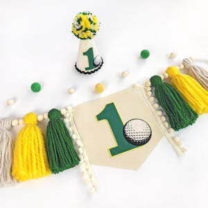 Hole in one birthday decor, golf first birthday banner and hat