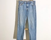Light to Medium Wash Vintage Denim Levi s with Orange Tab